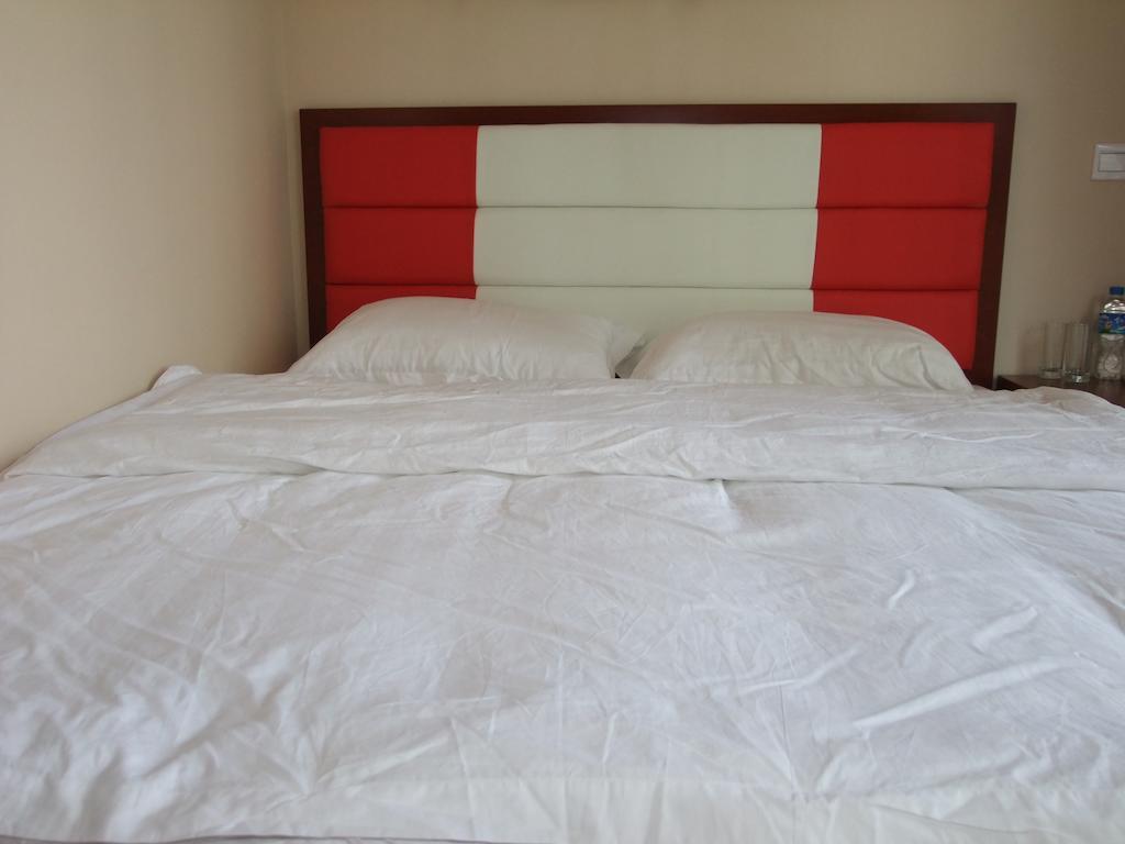 Chun Tian Hui Gu Holiday Hotel Kunming Værelse billede